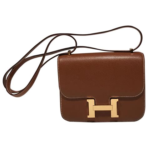 hermes black and gold cross body bag|authentic hermes crossbody bags.